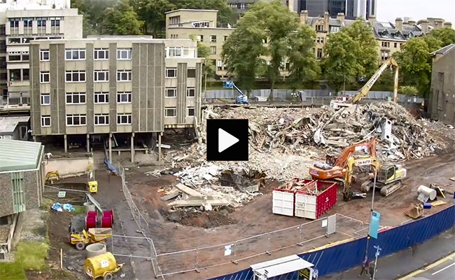 Image of a still from a time lapse video of the former Mathematics and Statistics building at Gilmorehill being demolished.