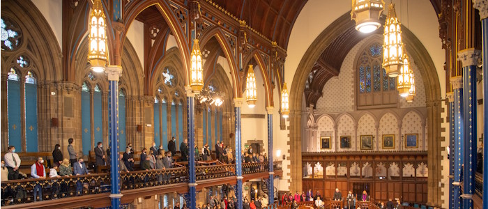 Students & parents in Bute Hall during graduation