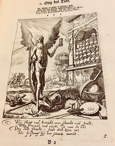 a monochrome printed image showing a winged emaciated figure holding a scythe in hos right hand and an hour glass in the left hand. There is a stack of skulls in the background and scattered items in the foreground, including a world globe, a lute, a painter's palette