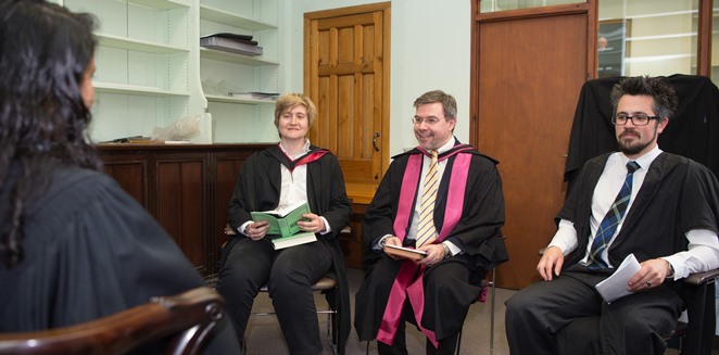 The three judges examine one of the students taking part in the Cowan Blackstone Medal 2018 were Professor Costas Panayotakis, Professor Catherine Steel, Professor of Classics; and Dr Adrastos Omissi, Lecturer in Latin Literature.