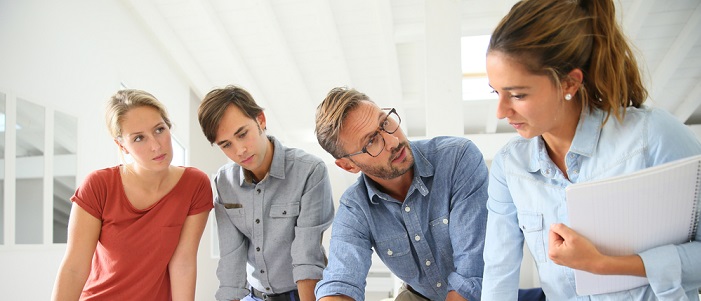 Group of office staff having a conversation