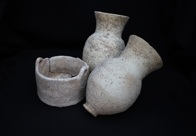 A photo of archaeological finds from modern day Iraq of a Drinking Cup And Faience Bucket Khani Masi 650