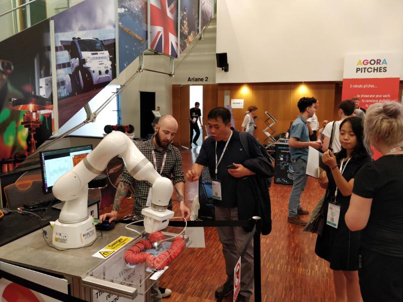 James and Rachael show off the medical robot in ESOF Toulouse