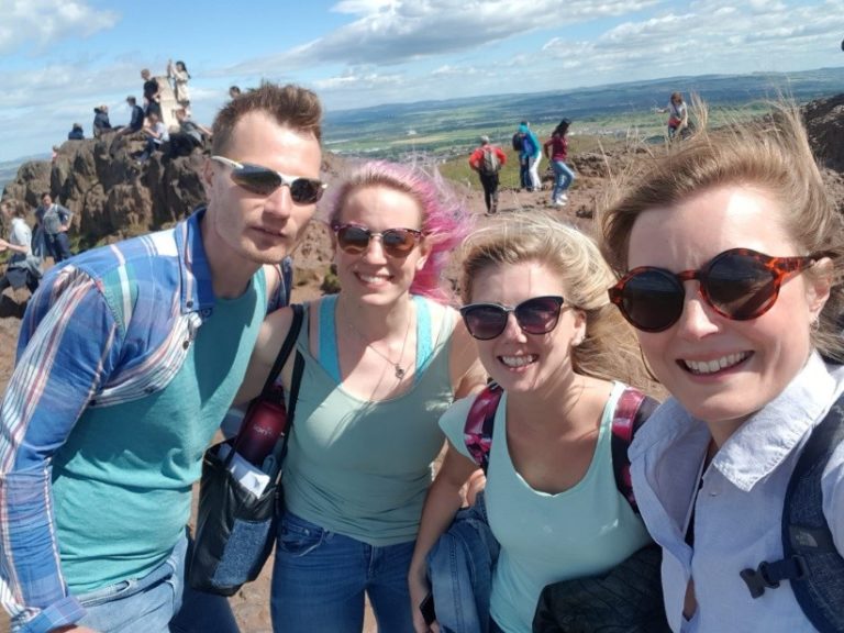 Group of students on the summit of a Scottish hill, 768x576