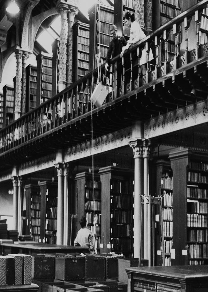 Boxes of books are hoisted down through the galleries of the old University library in the Gilbert Scott Building, on their way to the newly built library on Hillhead Street.