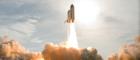 mage above: The fiery blaze below space shuttle Endeavour as it launches from NASA Kennedy Space Center's Launch Pad 39A bathes the smoke and steam with an orange glow. Photo credit: NASA/Tony Gray,