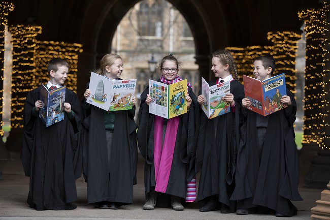 Pupils from St Patricks Primary School join Deputy First Minsiter John Swinnney to launch new teaching resources for schools created from UofG research.