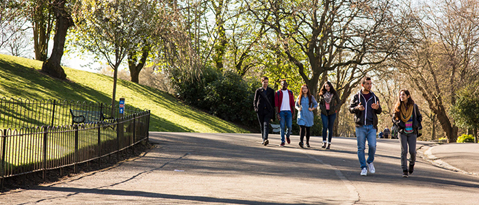 Students walking in park