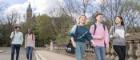 5 students in kelvingrove park with the Uni tower in the background