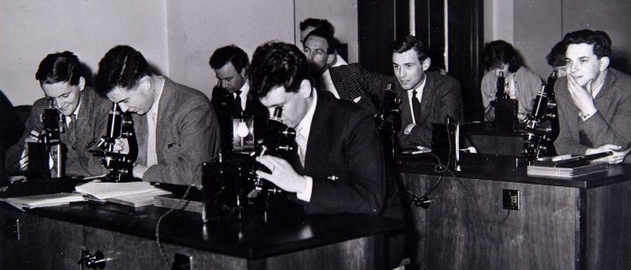 Medical students examining specimens under the microscope  in GRI pathology lab, thanks to Herald and Times Group