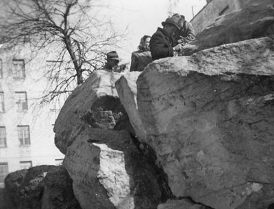 Pick & Hammer Club at marble outcrop on 207th Street off Broadway, 1942. 