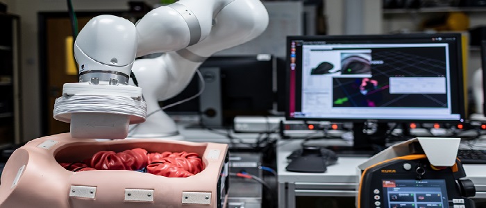 The robotic arm uses magnetic forces to guide the Sonopill through colon. Picture credit: University of Leeds