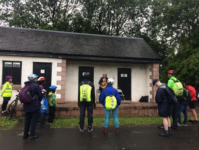 Clare Robertson performing at the Refugee Cycle 2018