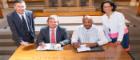A group photo of the Memorandum of Undersanding signing ceremony between the University of Glasgow and the University of the West Indies