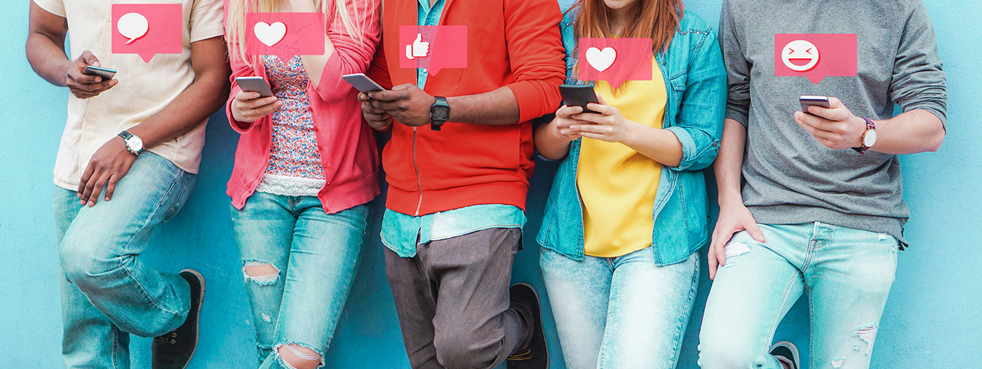 Girl watching a social media live stream, with social media emojis floating 