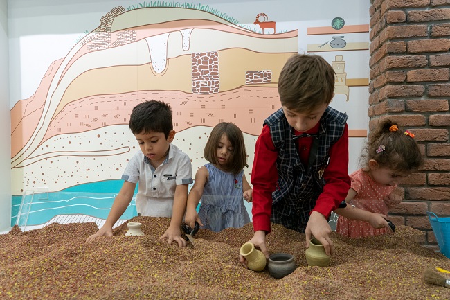 Children using the new museum space in an Iraqi museum created in conjunction with University of Glasgow archaeologists