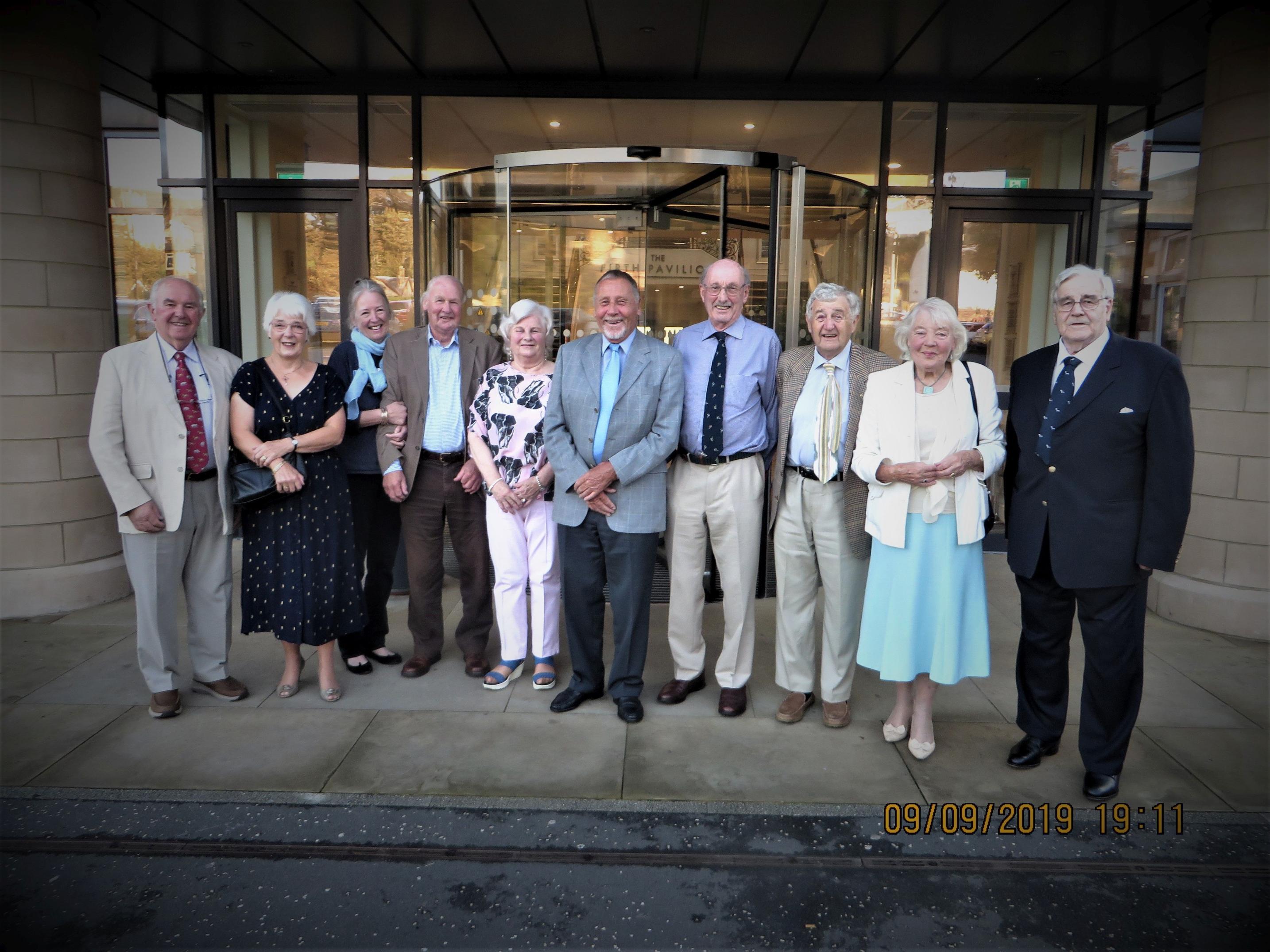 A group of vet graduates celebrating 60th anniversary