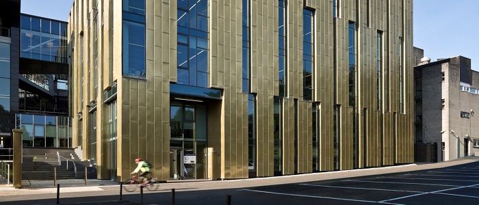 An angled view of the outside of the Sir Michael Stoker Building on a sunny day