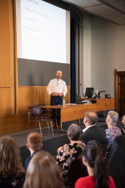 Photo of Jim Lewsey delivering inaugural lecture in 2019