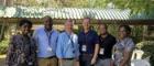 The Institute's Prof iain McInnes and Prof Paul Garside stand with AfrIBOP attendees in Kalifi, Kenya