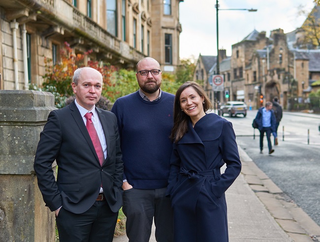 A photo of the Immersion Year Development Team left to right Gillebride MacMillan, Head of Celtic & Gaelic; Fiona Dunn, Gaelic Development Manager,  and Dr. Sìm Innes, Lecturer Celtic & Gaelic.