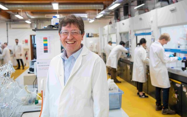 Professor Peter Skabara standing in a chemistry laboratory