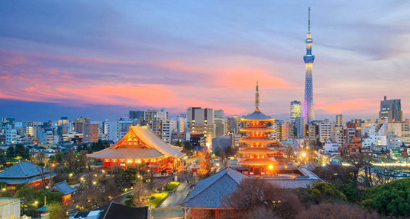 Tokyo skyline at sunset with Senso-ji Temple and Tokyo skytree.