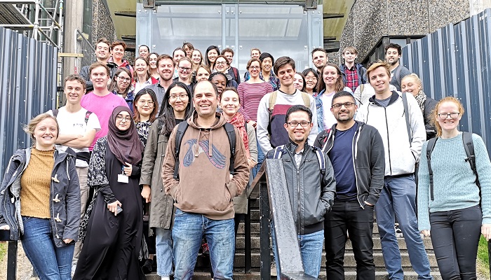 Dr Thomas Otto and students from the 2019 Summer School outside the Boyd Orr Building