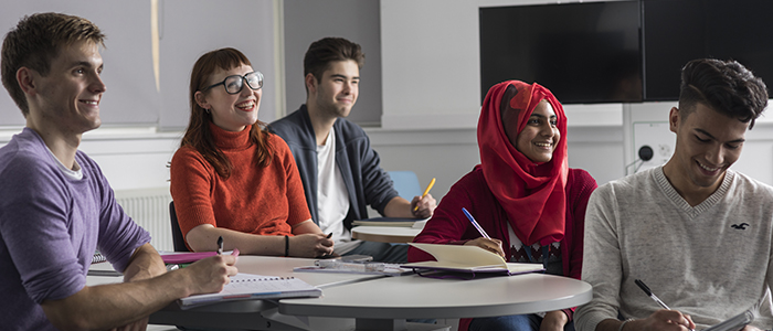 Five students in a class in the St Andrews Building