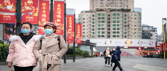 Image of Chinese women wearing masks