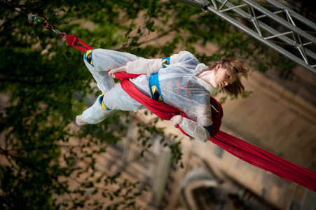 Photograph of an aerial performer as part of Ingenious Circus. 