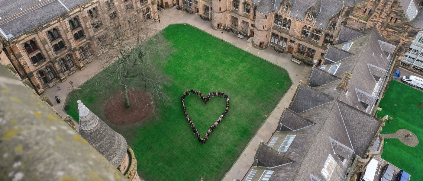 Aerial photo of the East Quadrangle, with students grouped in the shape of a heart. Photo by Greig Gallagher.