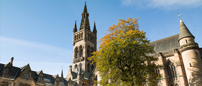 Image of the main building, with tree in foreground 