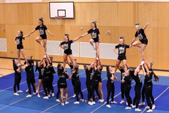 Cheer level 2 doing a pyramid stunt