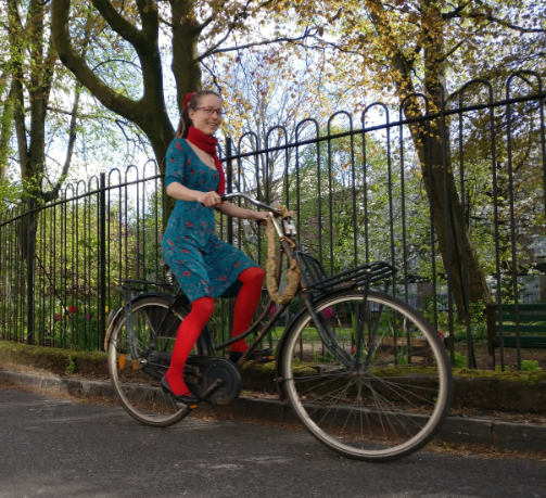 Bella on a bicycle