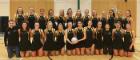 photo of the UofG netball club holding a ball
