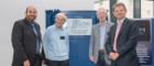 Prof David Bhella, Dr Richard Henderson, Prof Richard Cogdell and Prof Sir Anton Muscatelli unveiling a plaque at the SCMI opening symposium