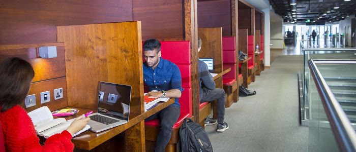 Students studying in the Library