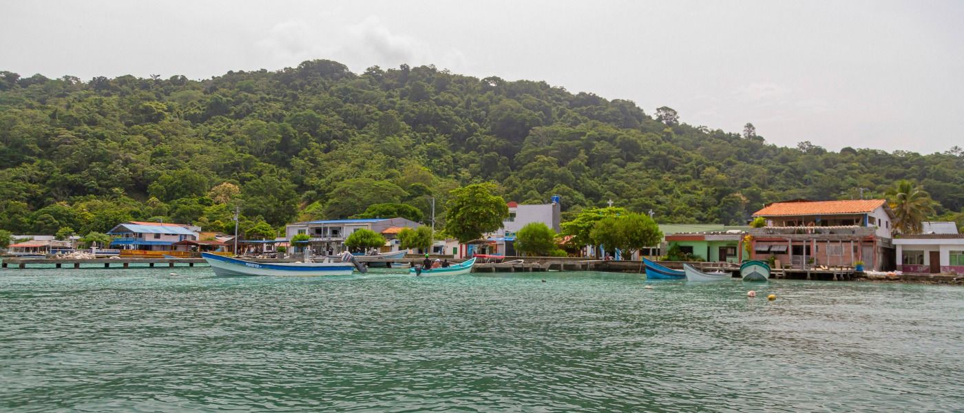 Photography of Landscape of colorful houses and boats with sea in Choco, Colombia