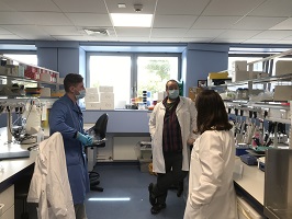 Rhian interviewed in lab with team
