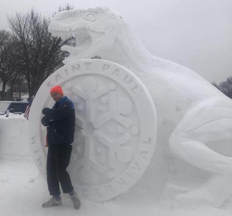 Moray Swanson in front of St Paul carnival snow sculpture
