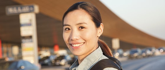 Student outside airport