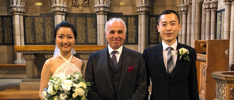 Bride and groom, Yangling and Louie, with Professor Phillip Schlesinger, who walked her down the aisle