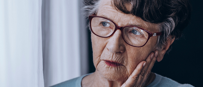 Photo of older woman looking concerned