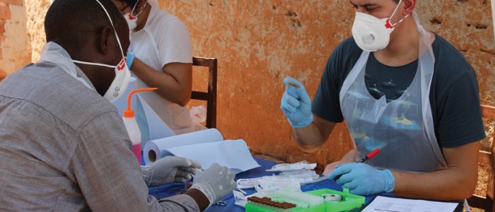 Developing a field-based laboratory in Uganda to identify sources of human infections. Photo: Mary Ryan.