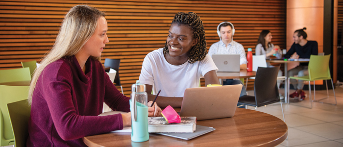 Photo of students in University of Glasgow library