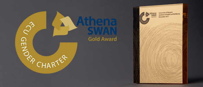Photo of Athena SWAN plaque with Gold logo next to it