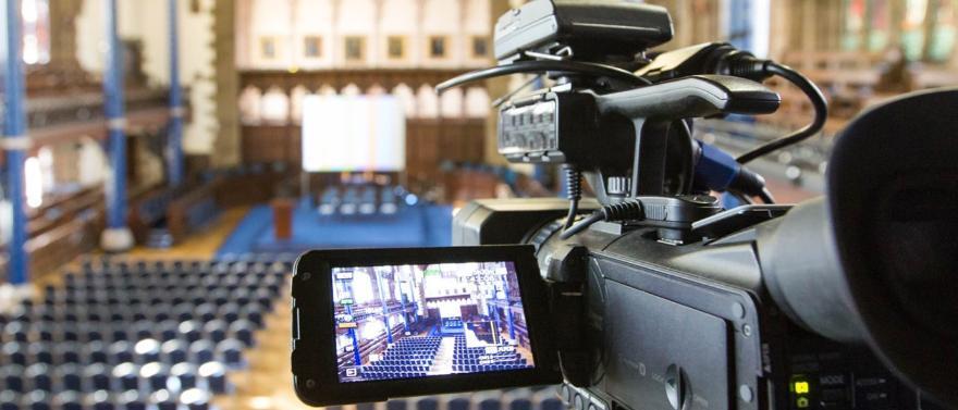 image of camera and empty bute hall