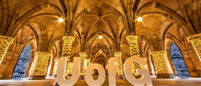 Large UofG letters in the fairy-lit Cloisters