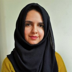 Portrait photo of Dr Farah Raja